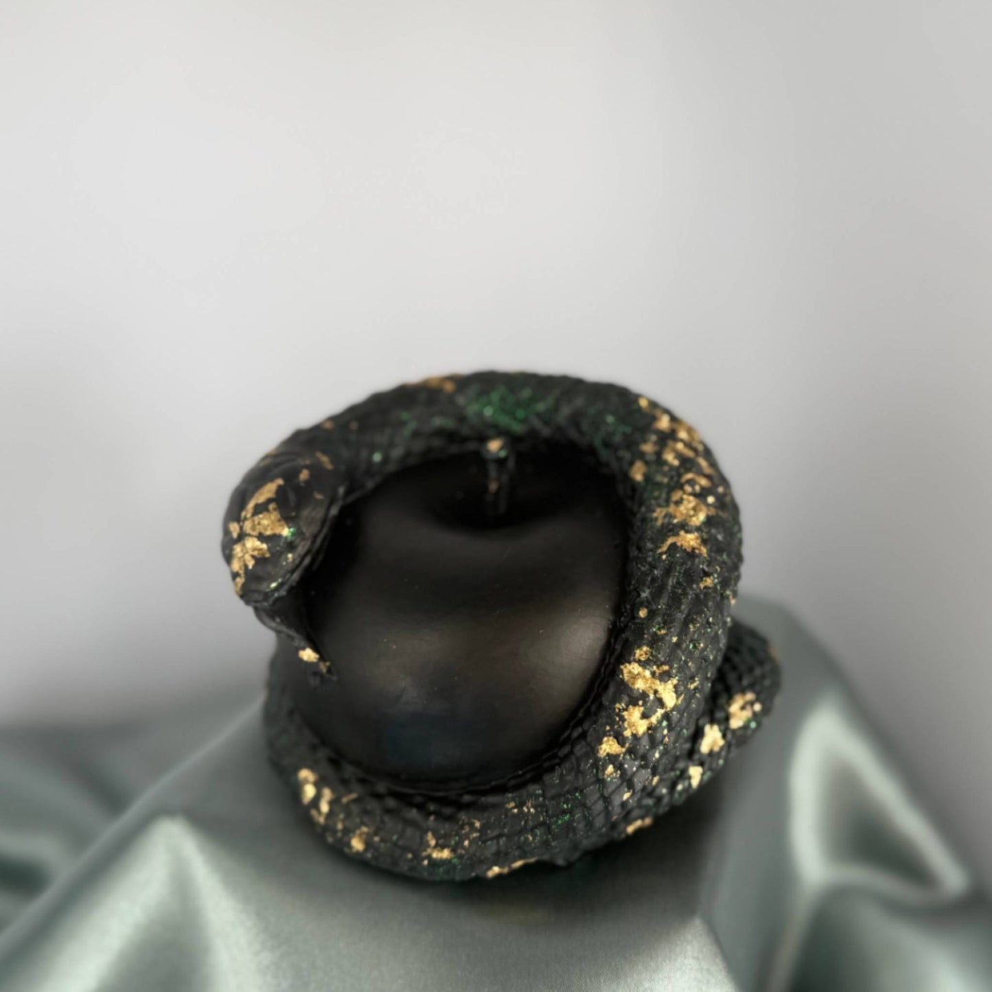 Forbidden Darkness sculptural ritual candle with black wax and gold accents
